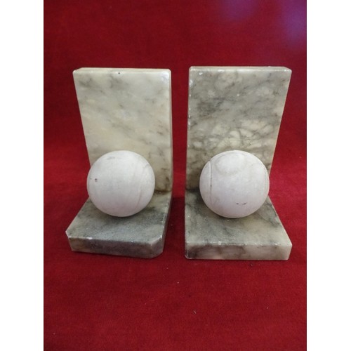 132 - A PAIR OF 20TH CENTURY ITALIAN CARVED ALABASTER TENNIS BALL BOOKENDS