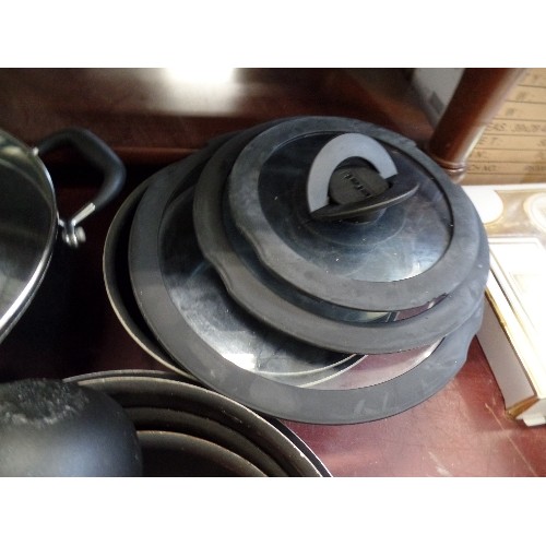 233 - SET OF TEFAL PANS WITH LIDS AND HANDLE.