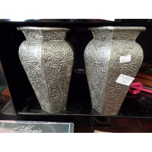 255 - PAIR OF EMBOSSED TIN VASES.