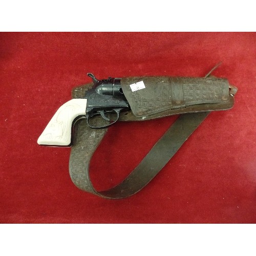 303 - VINTAGE MATTEL FANNER 50 CAP GUN. IN COWBOY HOLSTER.