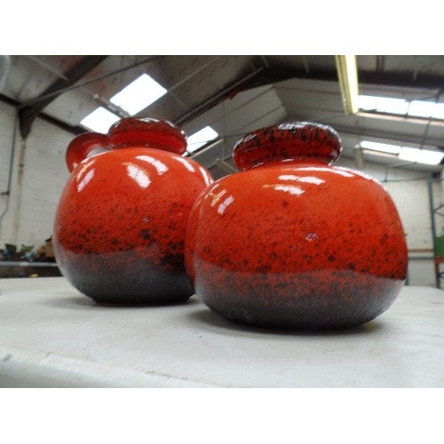 187 - TWO 1960'S WEST GERMAN LAVA VASES IN BRIGHT ORANGE, THE LARGER ONE WITH A HANDLE, NO 484-27