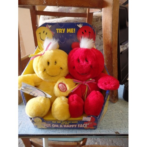 361 - NEW/PACKAGED 'PUT ON A HAPPY FACE-PRESS MY HAND & WE SING' RED & YELLOW SOFT TOYS.