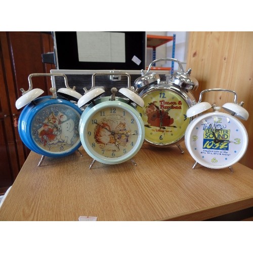 364 - 4 X DISNEY ETC TRADITIONAL ALARM CLOCKS WITH BELLS ON! INC TIMON AND PUMBAA, BEATRIX POTTER, AND THE... 