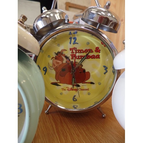 364 - 4 X DISNEY ETC TRADITIONAL ALARM CLOCKS WITH BELLS ON! INC TIMON AND PUMBAA, BEATRIX POTTER, AND THE... 