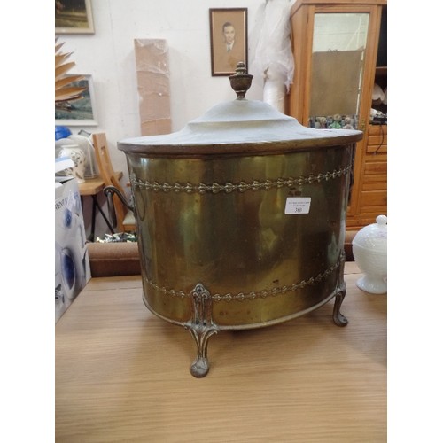 380 - 1920'S OVAL BRASS COAL BOX. WITH LID, AND RAISED ON LEGS. RING HANDLES.