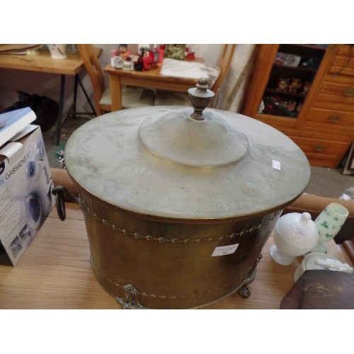 380 - 1920'S OVAL BRASS COAL BOX. WITH LID, AND RAISED ON LEGS. RING HANDLES.