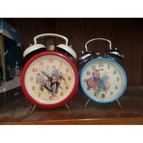 387 - THE A-TEAM, 80'S/90'S TV SERIES. 2 X TRADITIONAL ALARM CLOCKS WITH BELLS ON, 1 WITH THE A-TEAM CHARA... 