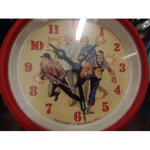 387 - THE A-TEAM, 80'S/90'S TV SERIES. 2 X TRADITIONAL ALARM CLOCKS WITH BELLS ON, 1 WITH THE A-TEAM CHARA... 