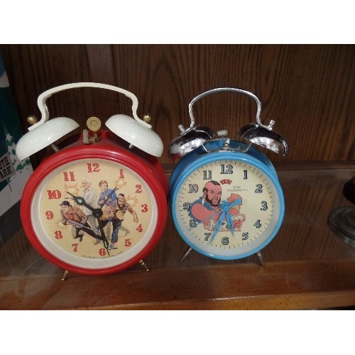 387 - THE A-TEAM, 80'S/90'S TV SERIES. 2 X TRADITIONAL ALARM CLOCKS WITH BELLS ON, 1 WITH THE A-TEAM CHARA... 