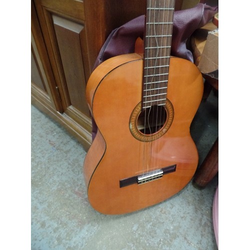 395 - ACOUSTIC GUITAR. KASUGA G 100.L. 1 BROKEN STRING. WITH PROTECTIVE BAG.