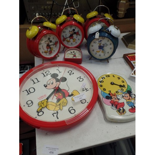 451 - DISNEY MICKEY MOUSE ALARM AND WALL CLOCKS. ALSO A DONALD DUCK, AND A MICKEY & MINNIE.