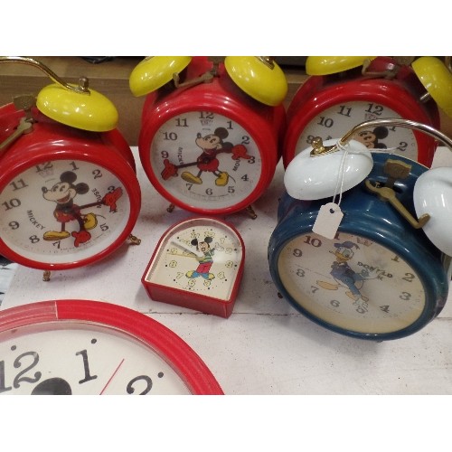 451 - DISNEY MICKEY MOUSE ALARM AND WALL CLOCKS. ALSO A DONALD DUCK, AND A MICKEY & MINNIE.