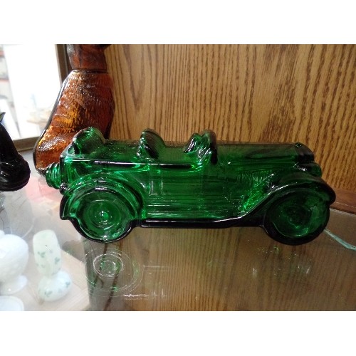 389 - A BROWN GLASS GERMAN SHEPHERD PERFUME DECANTER, TOGETHER WITH A GREEN GLASS RHINO, AND A GREEN GLASS... 