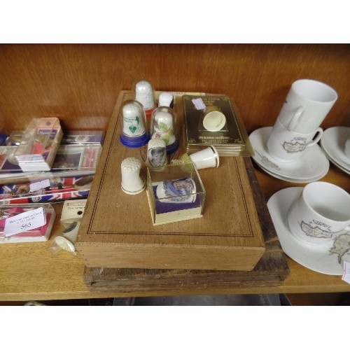 565 - SHELF OF MIXED CHINA, CYPRUS TEA SET, THIMBLES, COMMEMORATIVE SPOONS ETC