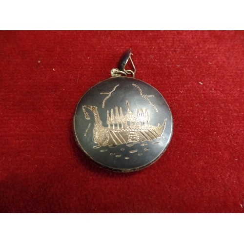 26 - SIAMESE SILVER PENDANT WITH BUDDHIST SYMBOL AND DRAGONNBOAT