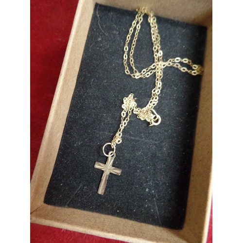 33 - 9 CT GOLD CHILDS CROSS AND CHAIN, 15