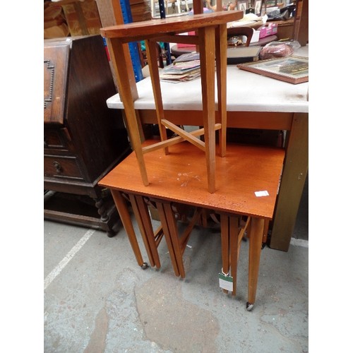 174 - RETRO 1960'S NEST OF FIVE TEAK TABLES BY POUL HUNDEVAD  - THE LARGER TABLE ON CASTORS. THE SMALL CIR... 