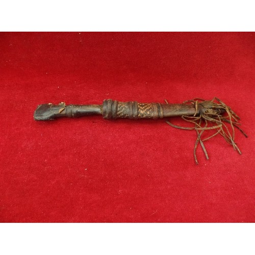 165 - AN EARLY 20TH CENTURY AFRICAN DAGGER WITH LEATHER COVERED GRIP. GOOD LEATHER SHEATH WITH TOOLED LEAT... 