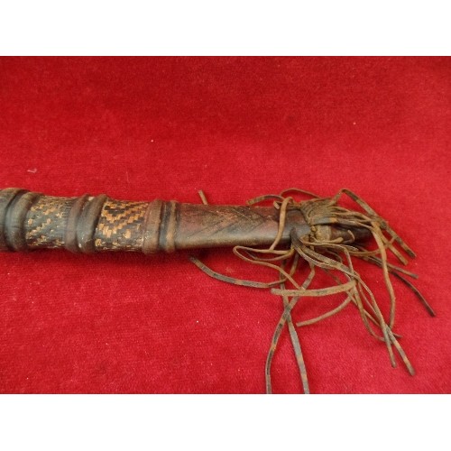 165 - AN EARLY 20TH CENTURY AFRICAN DAGGER WITH LEATHER COVERED GRIP. GOOD LEATHER SHEATH WITH TOOLED LEAT... 