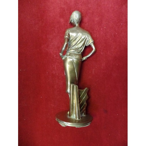 134A - HEAVY CAST BRASS FIGURE OF A LADY - CIRCA 1980 AND SHOWING ART DECO INFLUENCE - 30CM