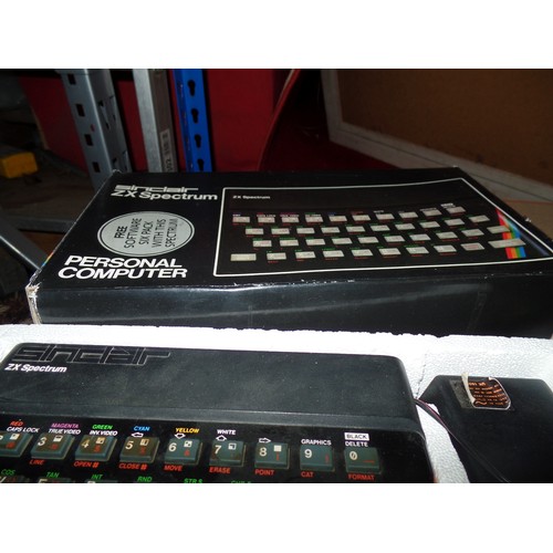 384 - A SINCLAIR ZX SPECTRUM PERSONAL COMPUTER WITH LEADS AND POWER SUPPLY WITH ORIGINAL BOX TOGETHER WITH... 