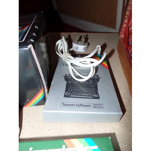 384 - A SINCLAIR ZX SPECTRUM PERSONAL COMPUTER WITH LEADS AND POWER SUPPLY WITH ORIGINAL BOX TOGETHER WITH... 