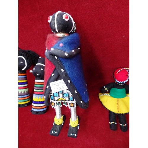 122A - A COLLECTION OF FOUR AFRICAN BEADWORK DOLLS, THE TALLEST 28CM