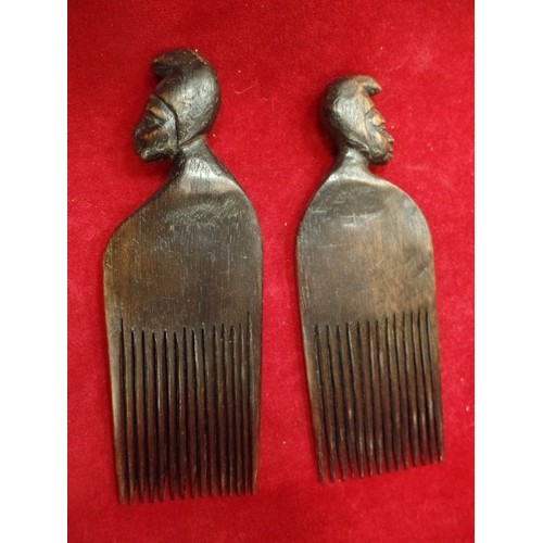 122B - TWO AFRICAN HAND CARVED WOODEN HAIR COMBS - 23CM