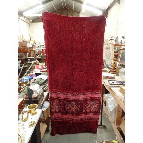 127 - A BEAUTIFUL 1920'S CHENILLE DOOR CURTAIN IN BURGUNDY WITH A PATTERN OF FLOWERS - WITH BRASS POLE RIN... 