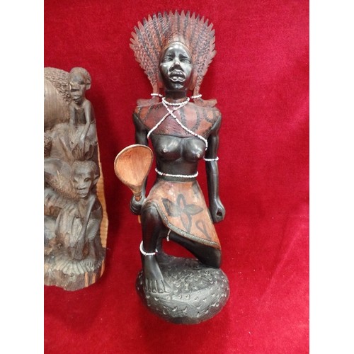 143 - A GROUP OF AFRICAN CARVED WOODEN FIGURES, THREE OF THEM WITH BEADED DECORATION