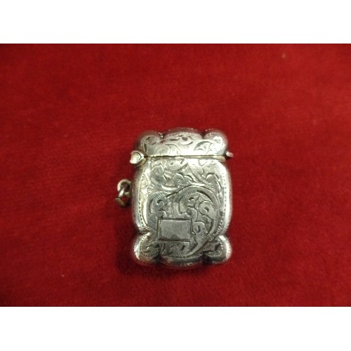 37 - A STERLING SILVER VESTA CASE WITH ENGRAVED SCROLL DESIGN AND BLANK SQUARE CARTOUCHE. BIRM 1931 JOHN ... 