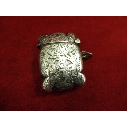 37 - A STERLING SILVER VESTA CASE WITH ENGRAVED SCROLL DESIGN AND BLANK SQUARE CARTOUCHE. BIRM 1931 JOHN ... 