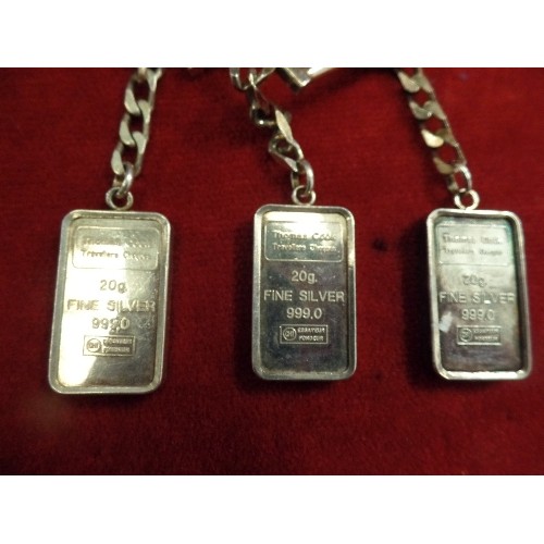 38 - 3 X 999 FINE SILVER BAR KEYRINGS BY THOMAS COOK TRAVELLERS CHEQUES ON ONE SIDE AND ARABIC SCRIPT ON ... 