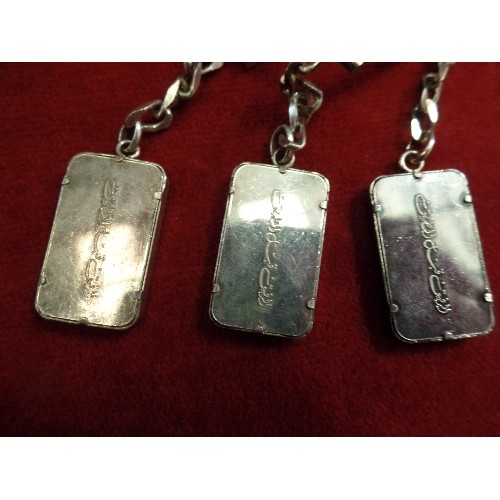 38 - 3 X 999 FINE SILVER BAR KEYRINGS BY THOMAS COOK TRAVELLERS CHEQUES ON ONE SIDE AND ARABIC SCRIPT ON ... 