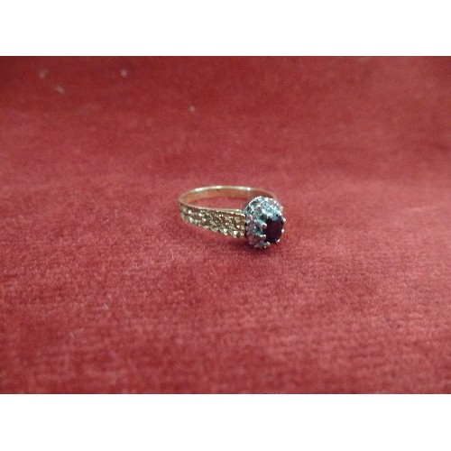 46 - AN 18CT GOLD RING WITH VERY DARK BLUE SAPPHIRE AND 8 DIAMONDS - SIZE R/S, 4.2 GRAMS