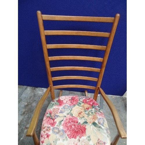 176 - A 20TH CENTURY LADDER BACK ROCKING CHAIR WITH UPHOLSTERED SEAT AND A LOOSE BACK CUSHION