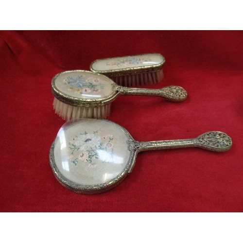 128A - A VINTAGE 1930'S DRESSING TABLE SET WITH PETIT POINT DECORATION INCLUDING TRAY, BRUSHES AND A MIRROR