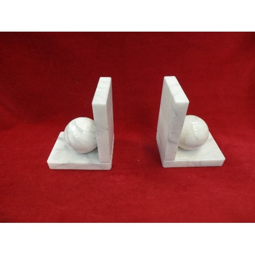 132A - PAIR OF HAND-CARVED MARBLE SPHERE BOOK ENDS. BY ALABASTRI-MARIO DUCCESCHI-ITALY. WITH CERTIFICATE.