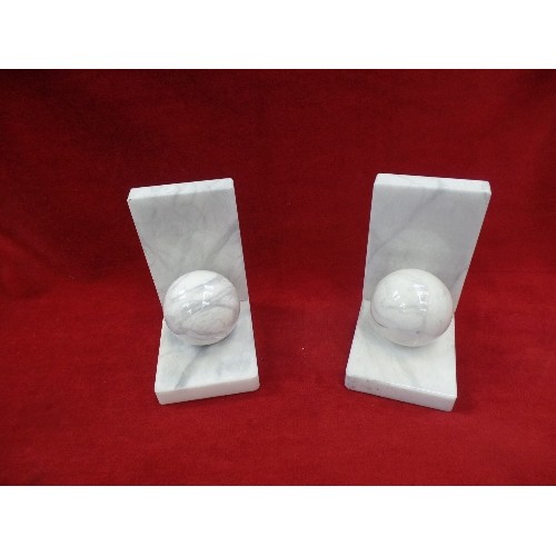 132A - PAIR OF HAND-CARVED MARBLE SPHERE BOOK ENDS. BY ALABASTRI-MARIO DUCCESCHI-ITALY. WITH CERTIFICATE.