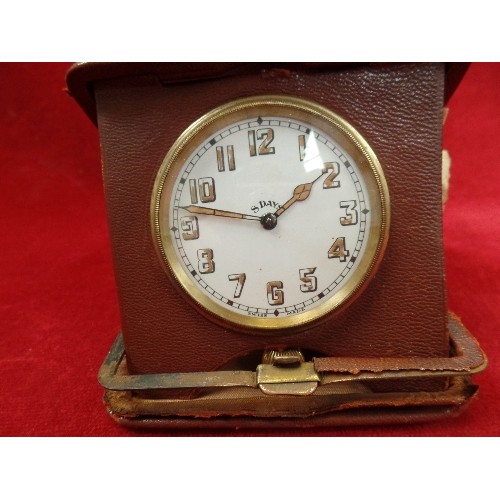 59A - 1920'S SWISS-MADE 8 DAY POCKET WATCH STYLE CLOCK SET IN LEATHER TRAVEL CASE [WHICH IS FRAGILE] FULLY... 