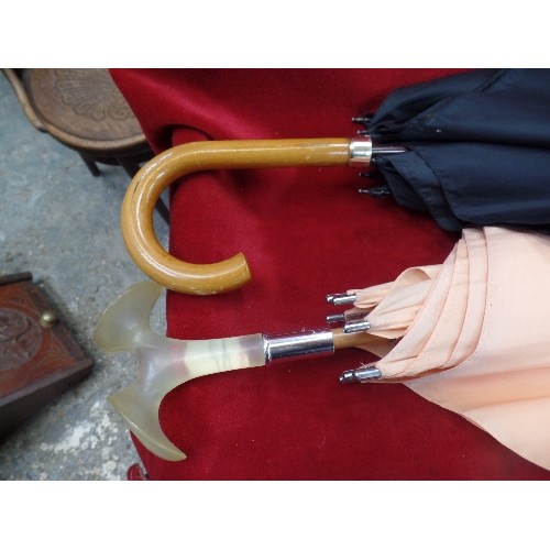 125F - BEAUTIFUL PEACH UMBRELLA BY PARFUMS LAGERFELD-PARIS, WITH CHLOE RESIN LILY HANDLE. TOGETHER WITH A B... 