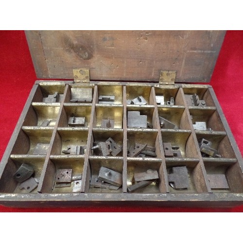 294 - VINTAGE SET OF PRESS DIES OR STAMPS IN A FITTED METAL LINED WOODEN BOX