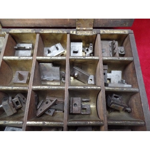294 - VINTAGE SET OF PRESS DIES OR STAMPS IN A FITTED METAL LINED WOODEN BOX