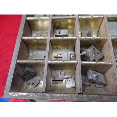 294 - VINTAGE SET OF PRESS DIES OR STAMPS IN A FITTED METAL LINED WOODEN BOX