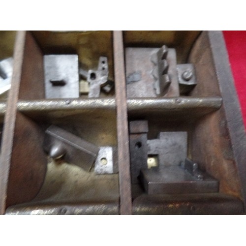 294 - VINTAGE SET OF PRESS DIES OR STAMPS IN A FITTED METAL LINED WOODEN BOX