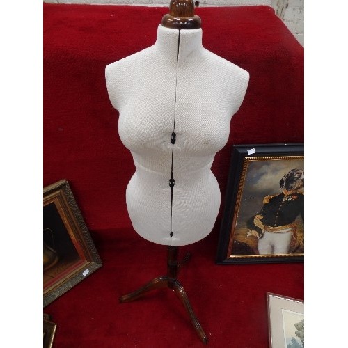 380 - AN ADJUSTABLE DRESSMAKERS OR TAILORS MANNEQUIN ON A WOODEN TRIPOD BASE