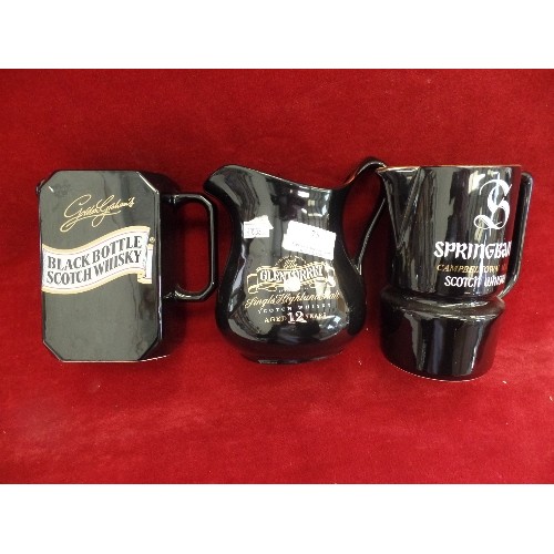 75 - 3 X WHISKEY BRANDED BAR JUGS. 2 ARE WADE. ALL ARE BLACK.