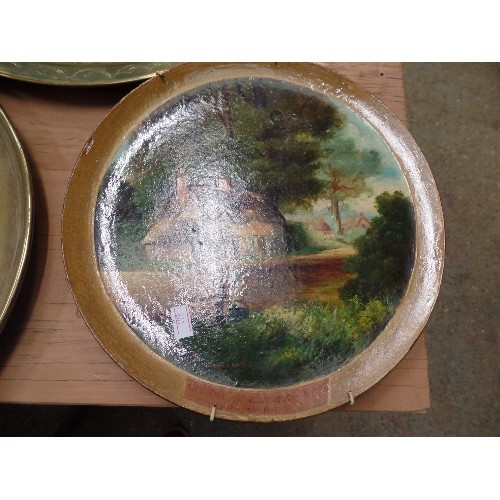 246 - 2 BRASS CHARGERS/PLATES AND A HAND-PAINTED TERRACOTTA PLATE.