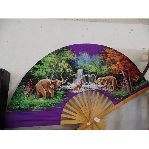 144 - LARGE DECORATIVE FAN. HAND-PAINTED WITH ELEPHANTS PLAYING IN WATERFALL.