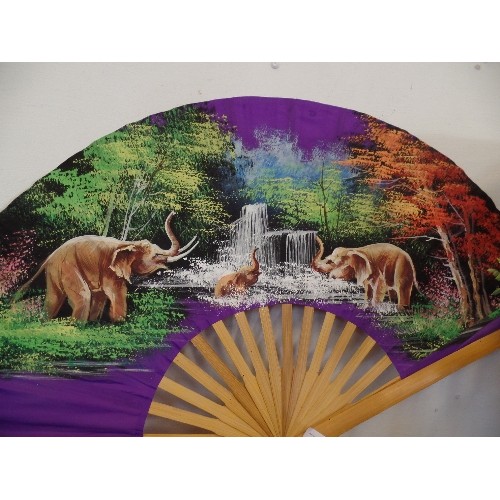 144 - LARGE DECORATIVE FAN. HAND-PAINTED WITH ELEPHANTS PLAYING IN WATERFALL.